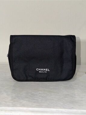 CHANEL Black Toiletry Pouch with White Logo